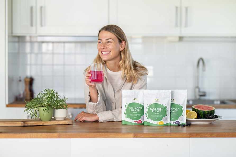 Healthwell Collagen Pulver Marint fra Healthwell st�r p� et k�kkenbord.