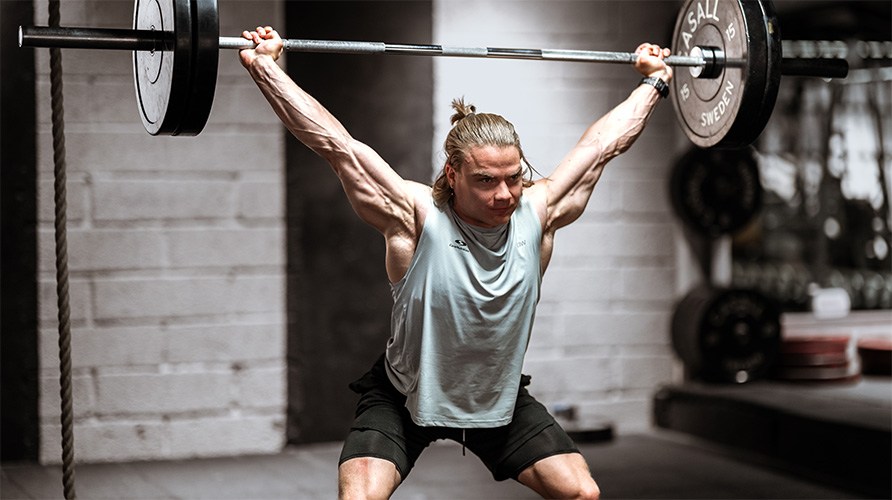 En mand udfrer velsen trk.